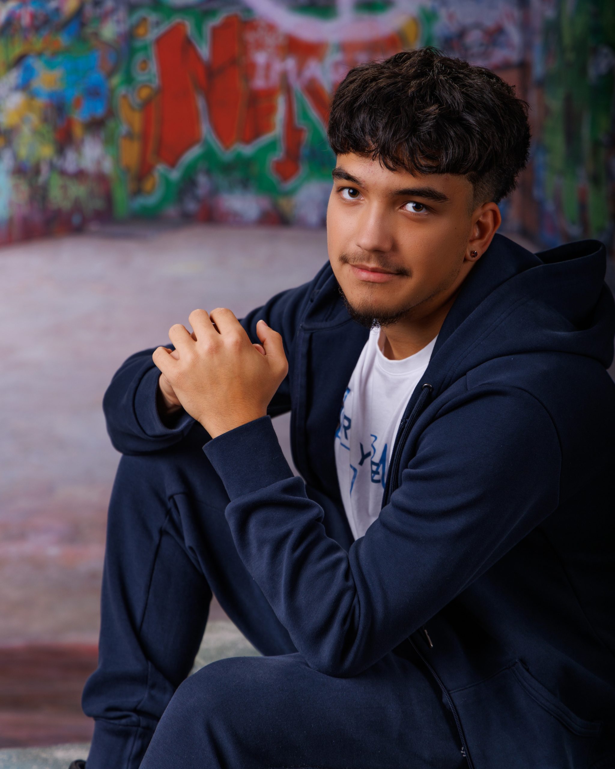 Allen Park senior photography session featuring a student holding a book