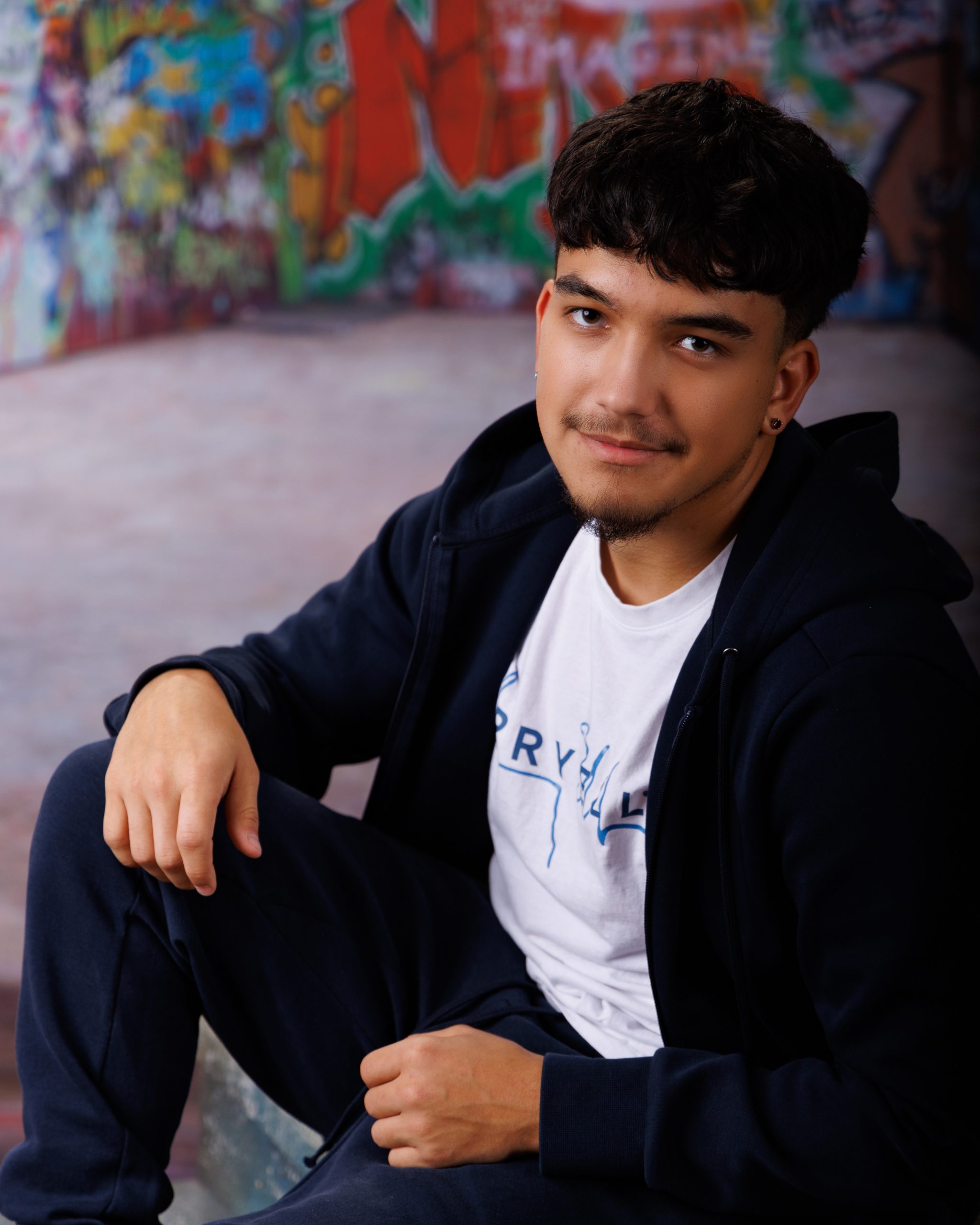 Allen Park senior photography session featuring a student holding a book