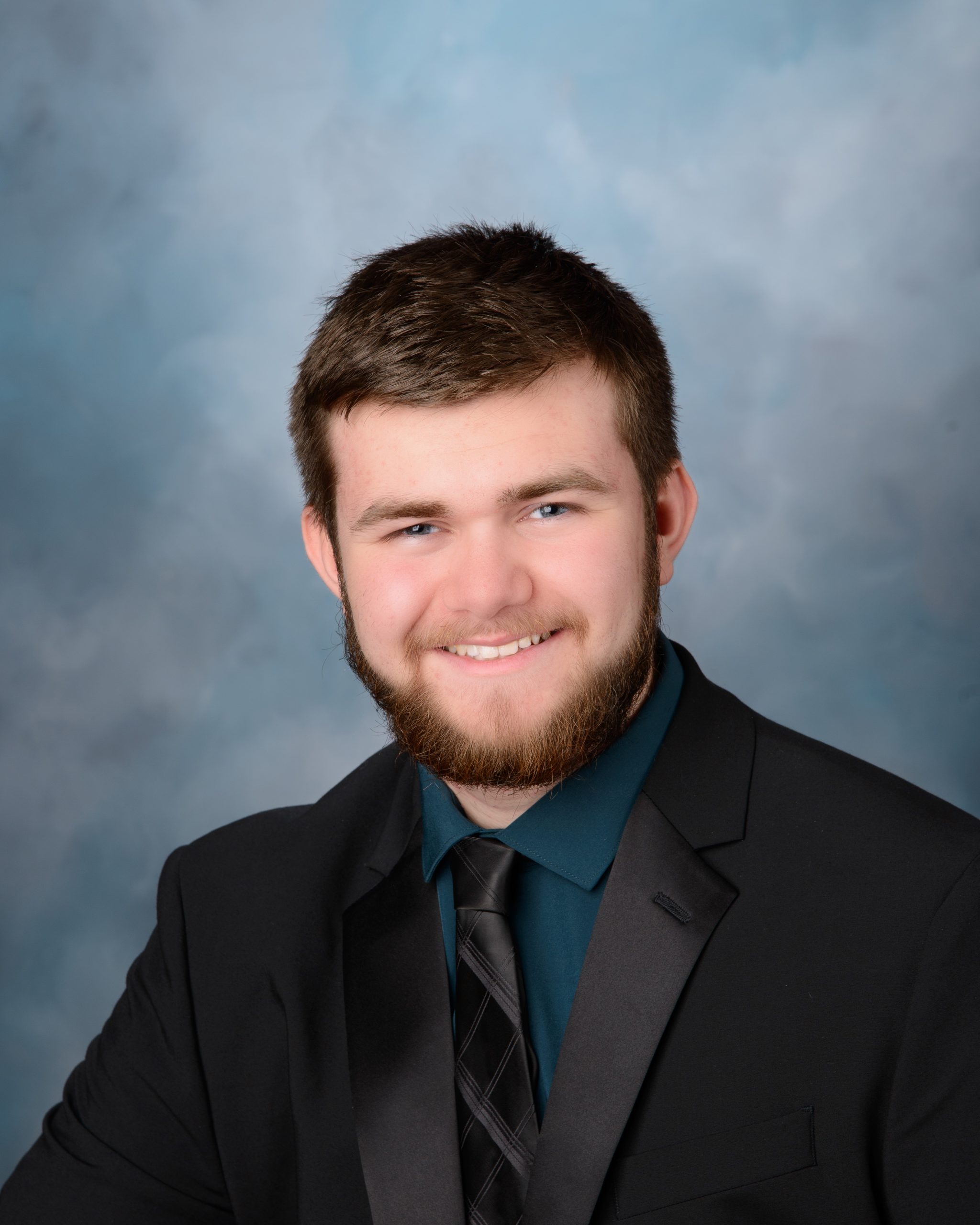 Allen Park Class of 2025 senior photo session holding 'Class of 2025' chalkboard