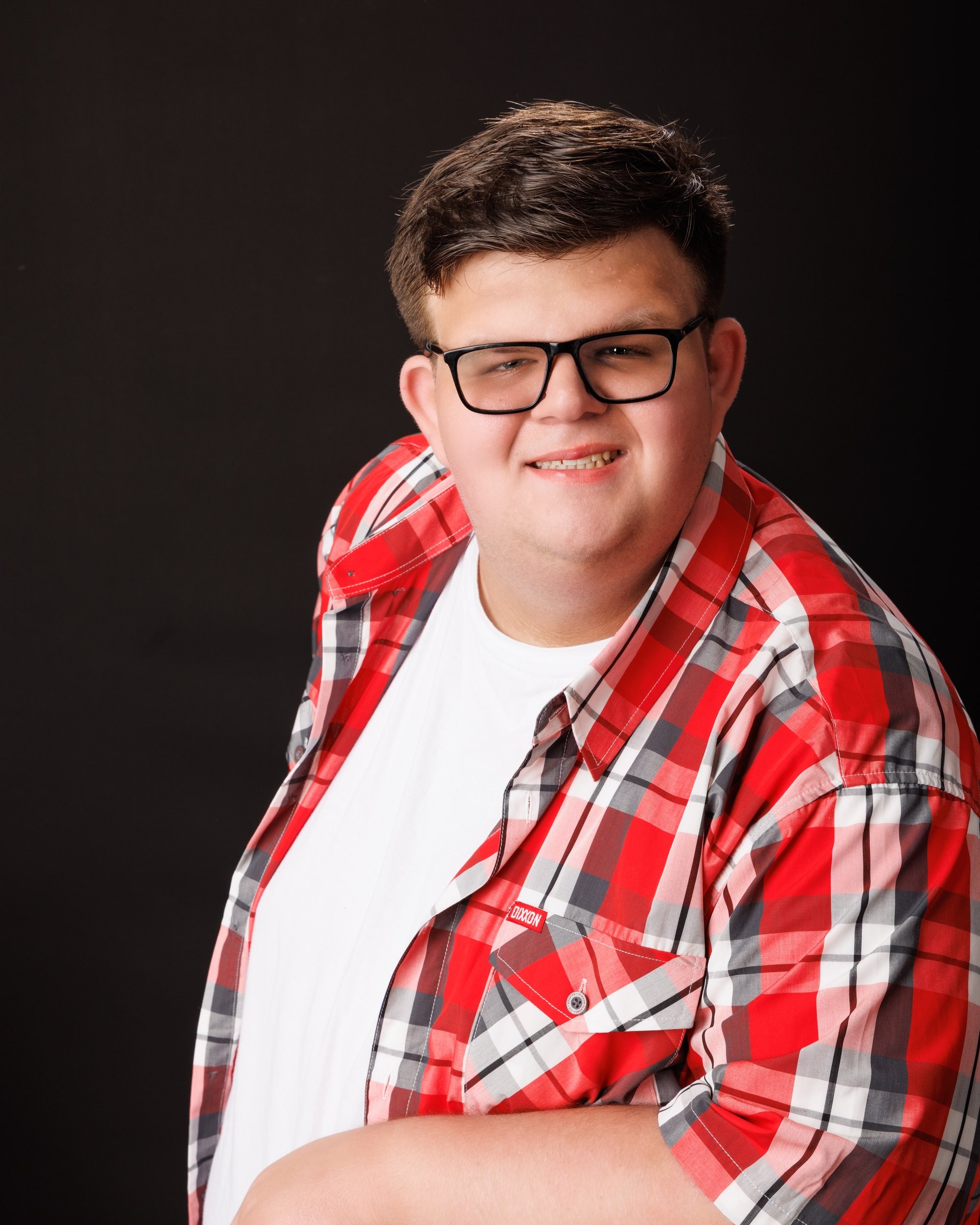 Monochrome senior portrait of Cameron at Allen Park studio