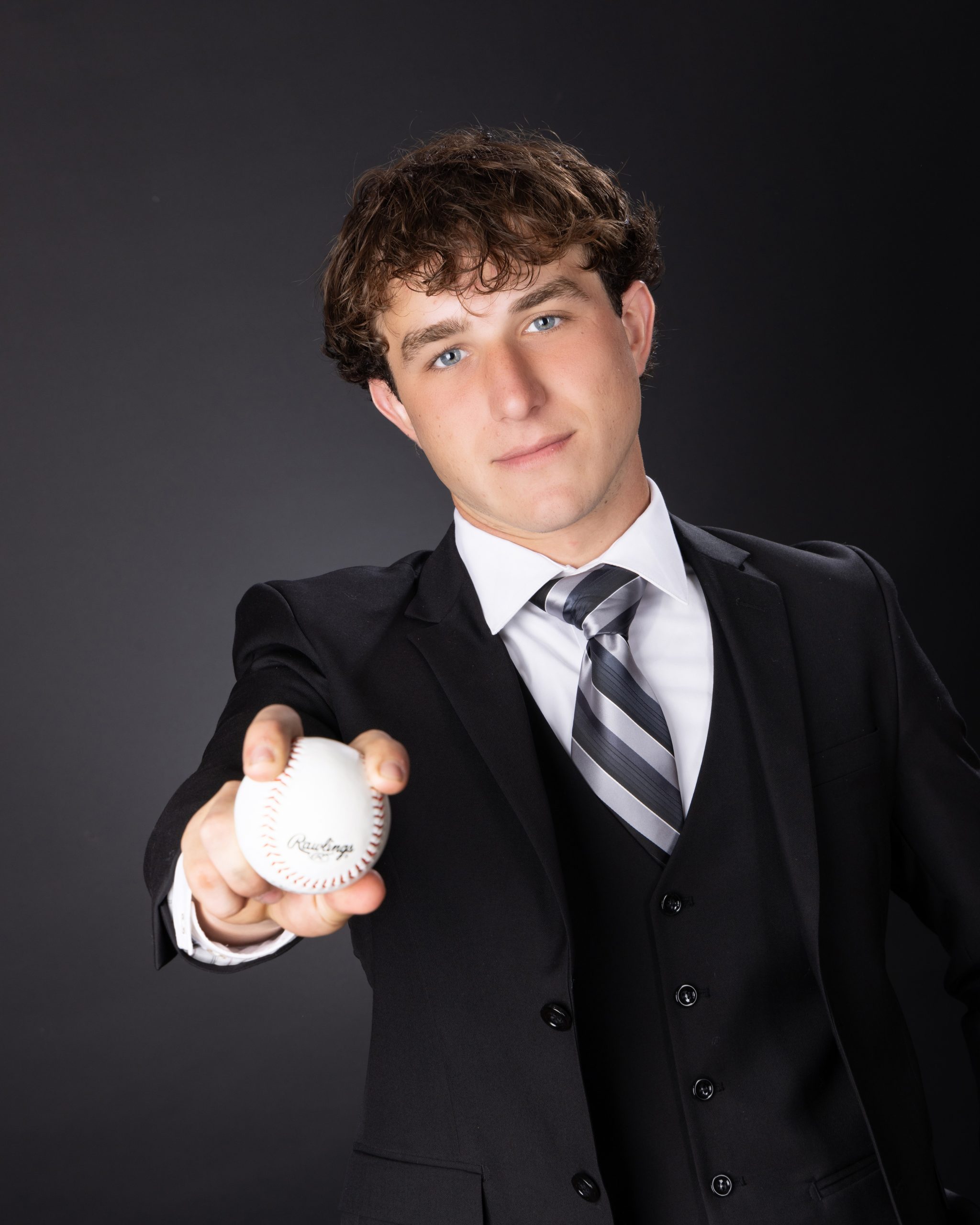 Allen Park Senior Cody 2025 adjusting vest with white shirt and black trousers