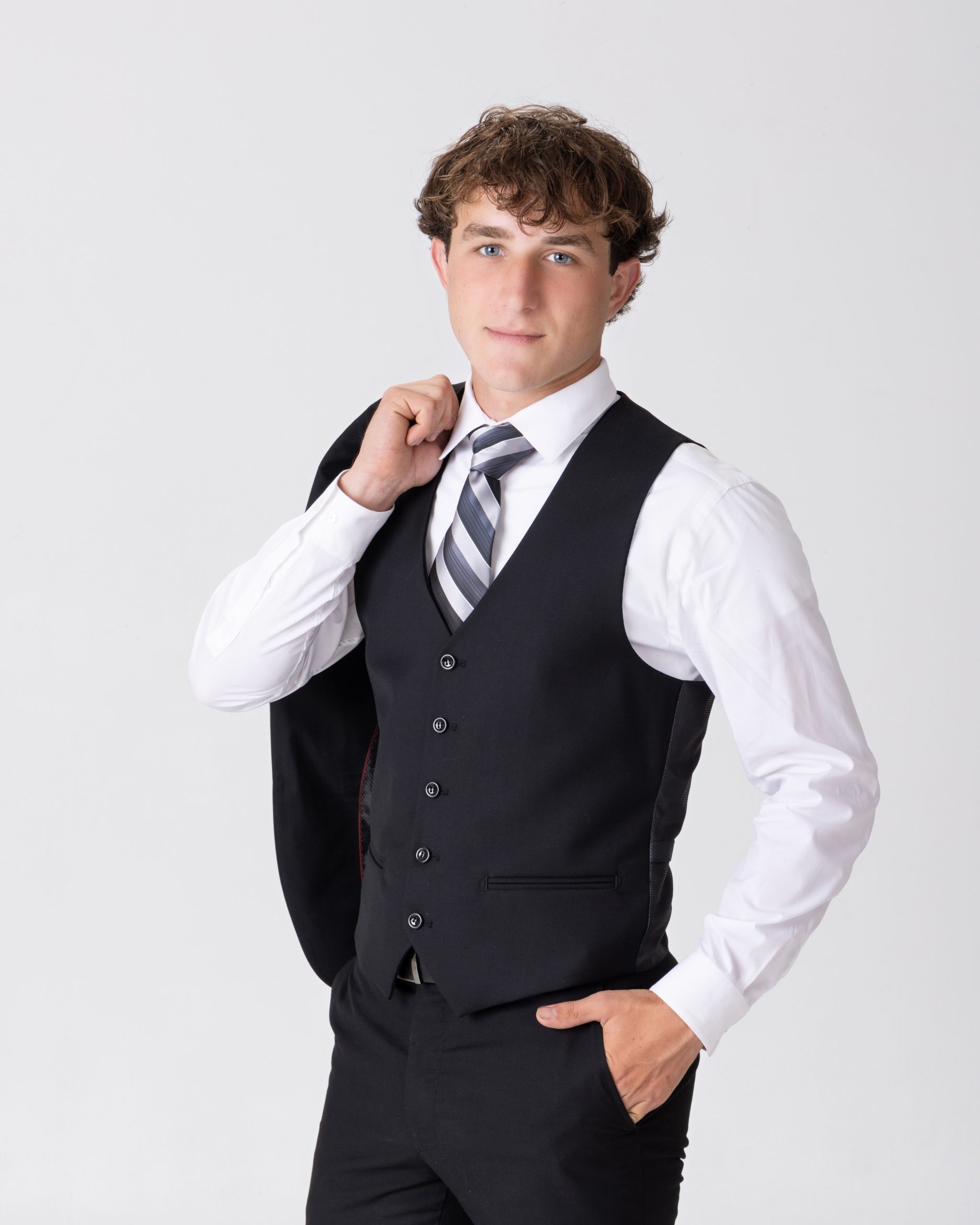 Allen Park Senior Cody 2025 adjusting vest with white shirt and black trousers
