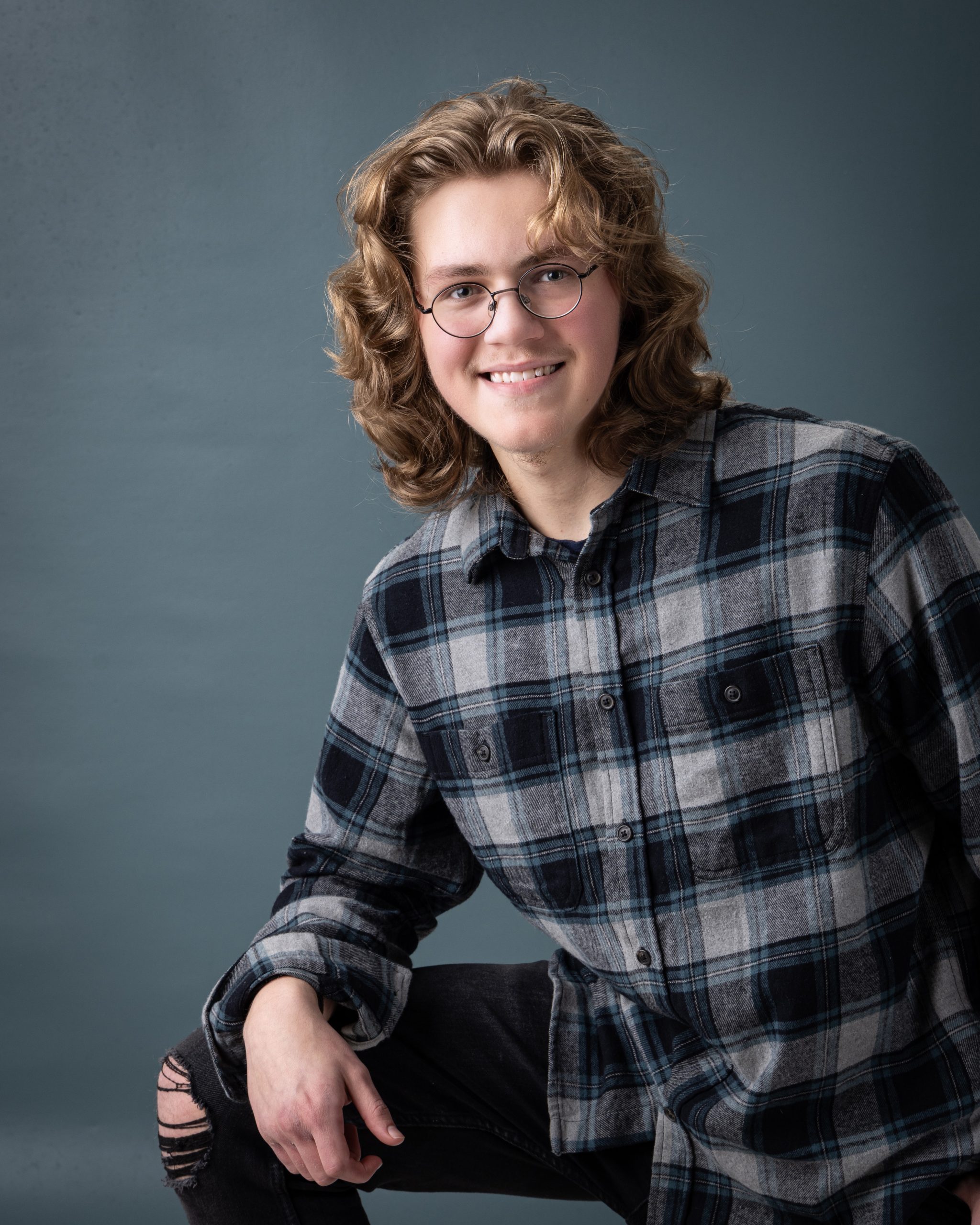 Allen Park senior portrait showing Gavin wearing a TARDIS t-shirt under plaid shirt
