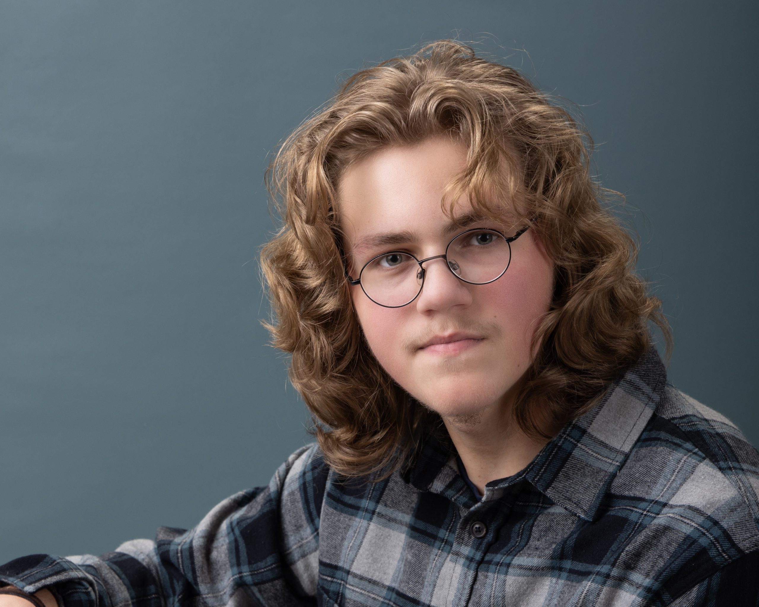 Allen Park senior portrait showing Gavin wearing a TARDIS t-shirt under plaid shirt