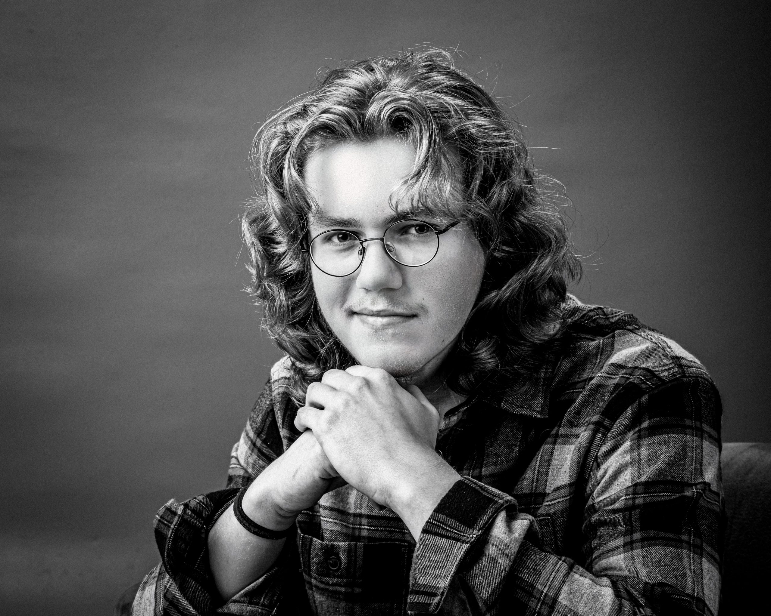 Allen Park senior portrait showing Gavin wearing a TARDIS t-shirt under plaid shirt