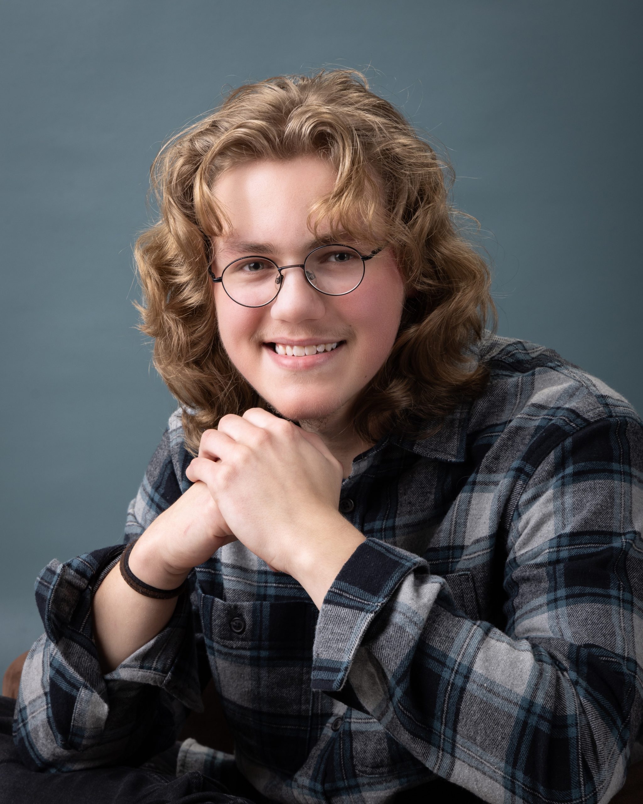 Allen Park senior portrait showing Gavin wearing a TARDIS t-shirt under plaid shirt