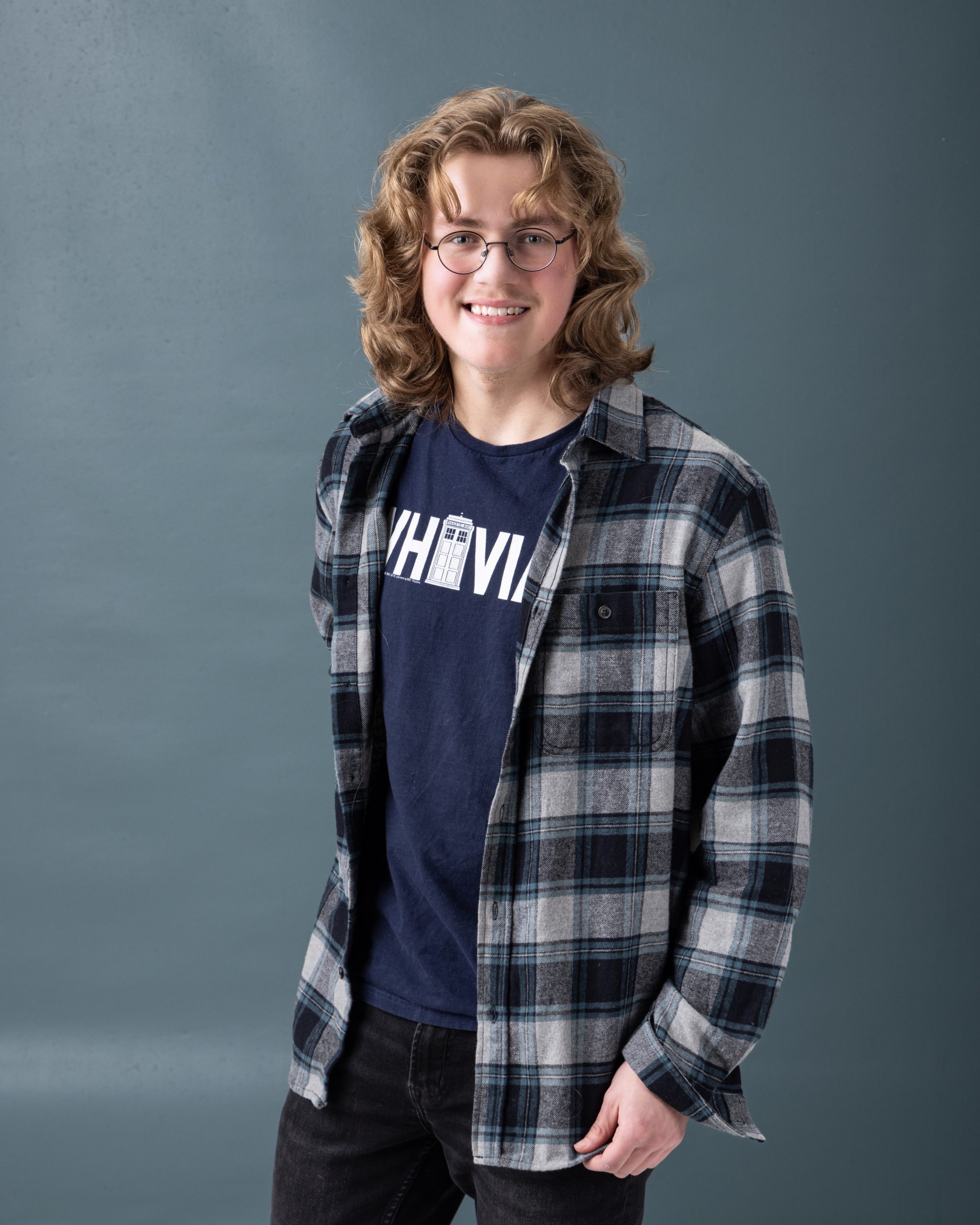 Allen Park senior portrait showing Gavin wearing a TARDIS t-shirt under plaid shirt