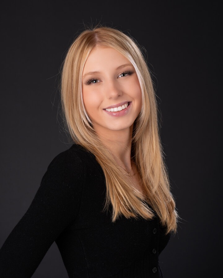 Downriver senior photography session with natural lighting and studio backdrop
