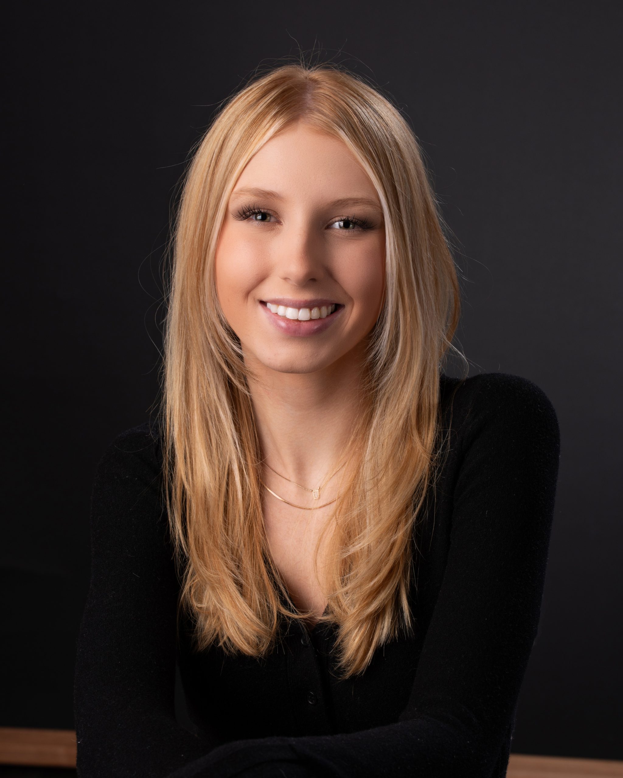 Downriver senior photography session with natural lighting and studio backdrop