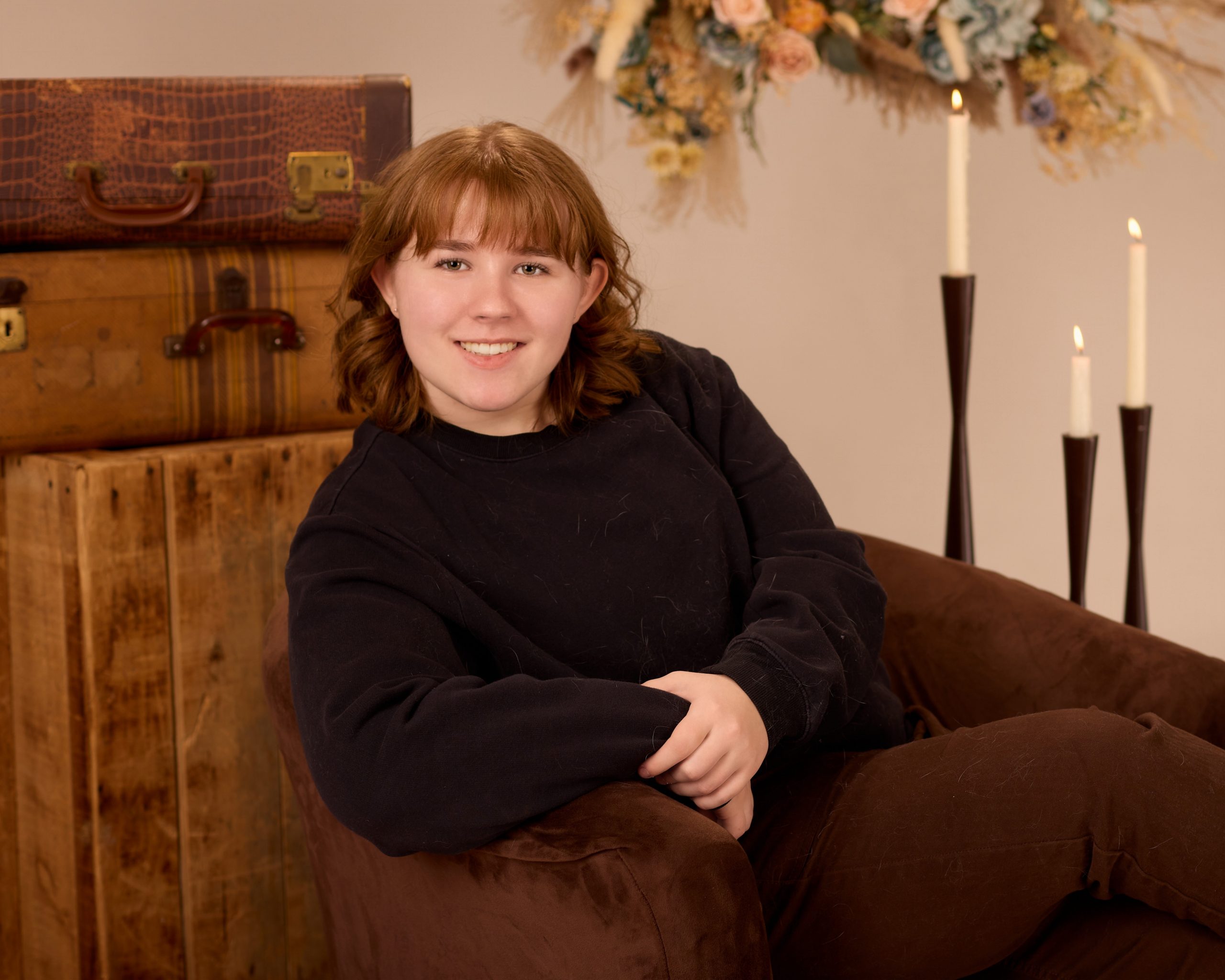 Evelyn in floral-decorated setting for Allen Park senior photography session