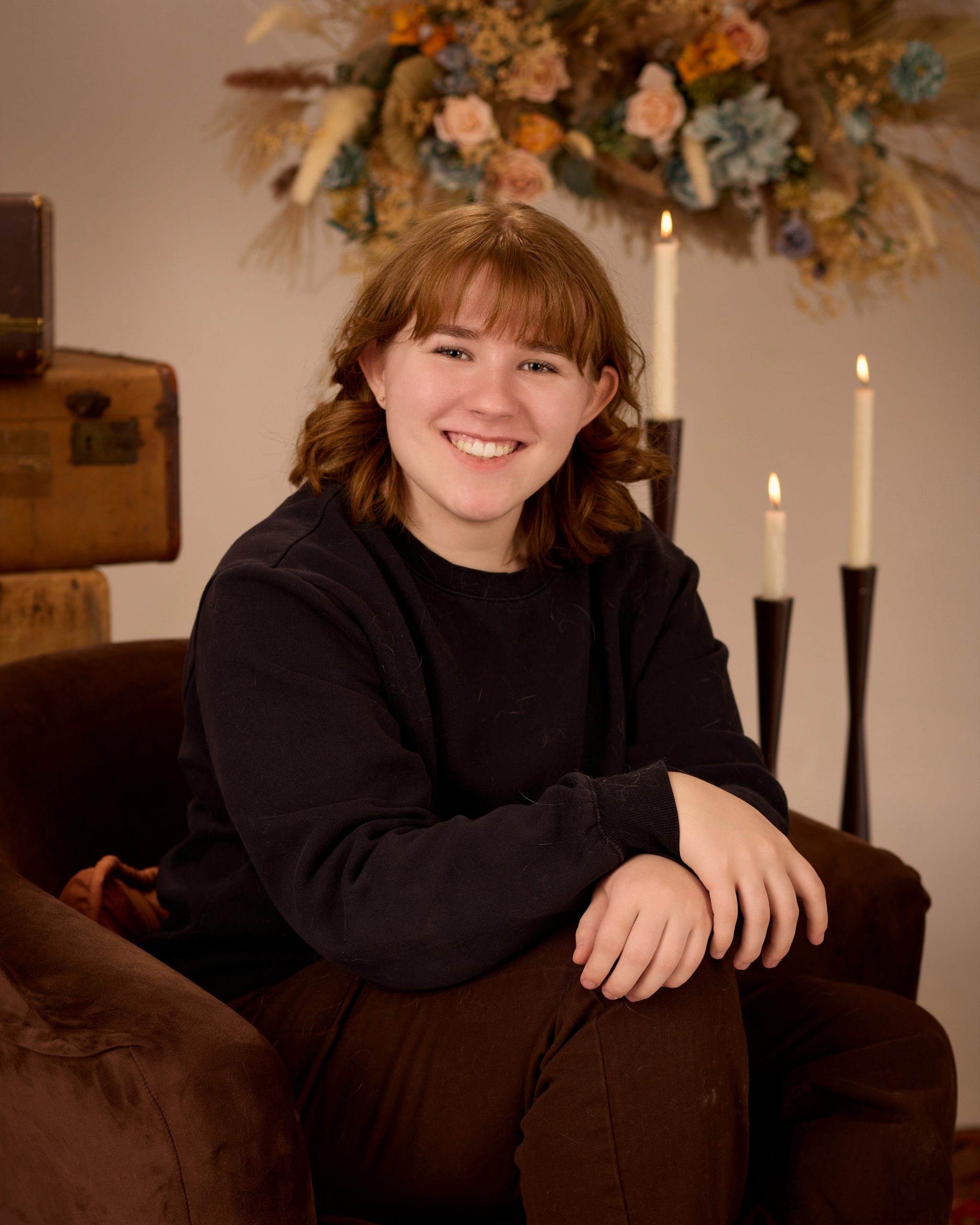 Evelyn in floral-decorated setting for Allen Park senior photography session