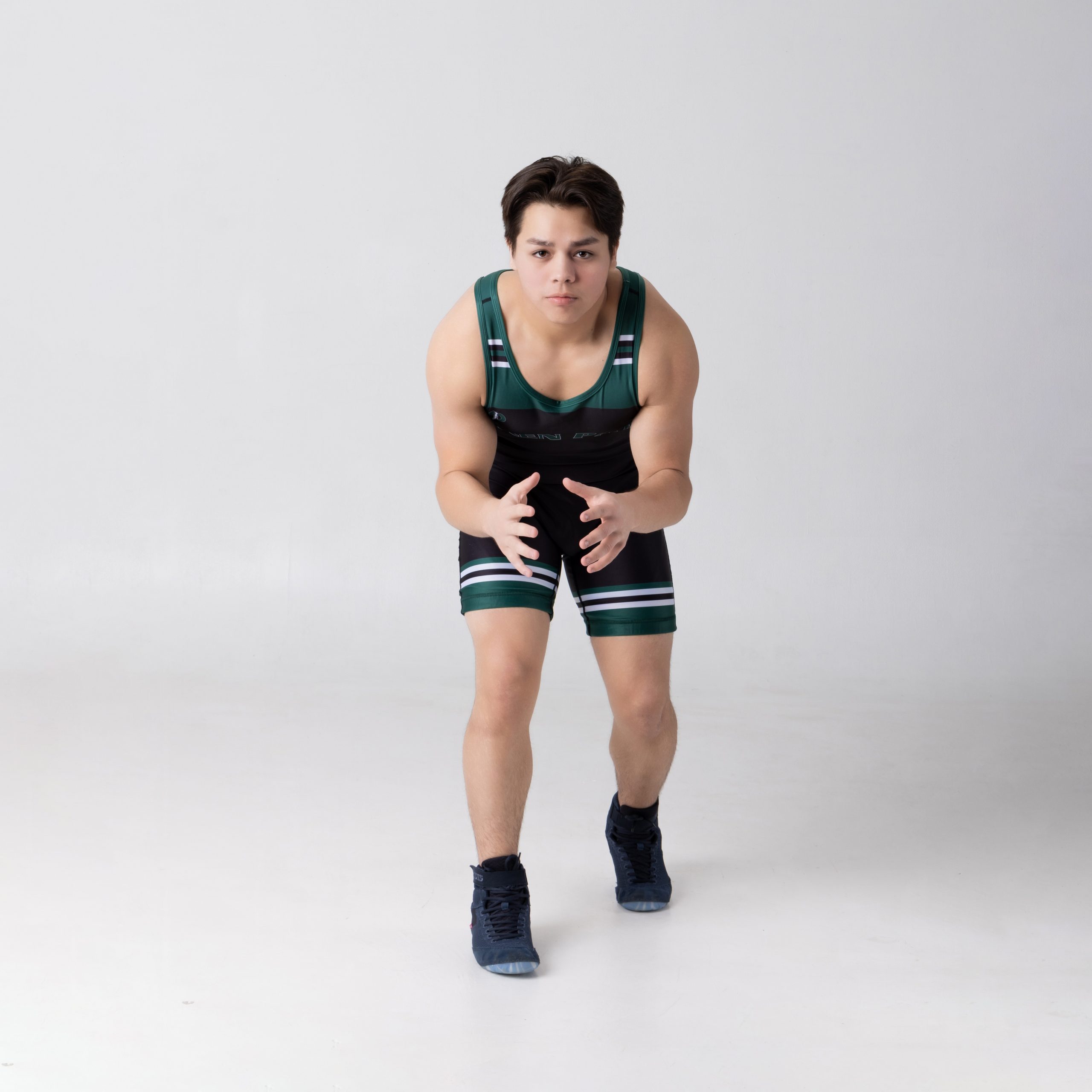 Wrestler hands up, ready pose for Allen Park senior photo shoot