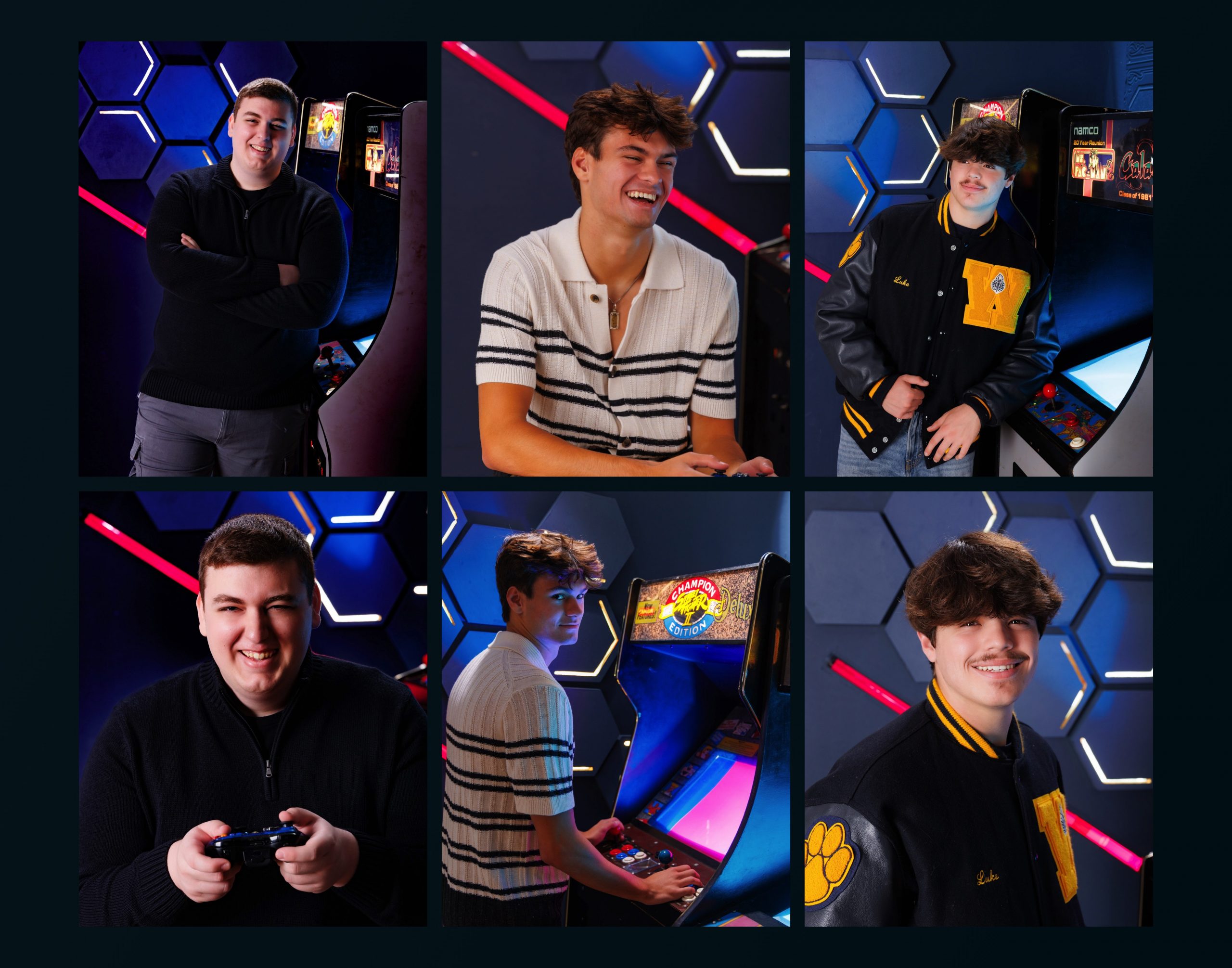 Student in striped polo and dark jacket holding game controller during photo session