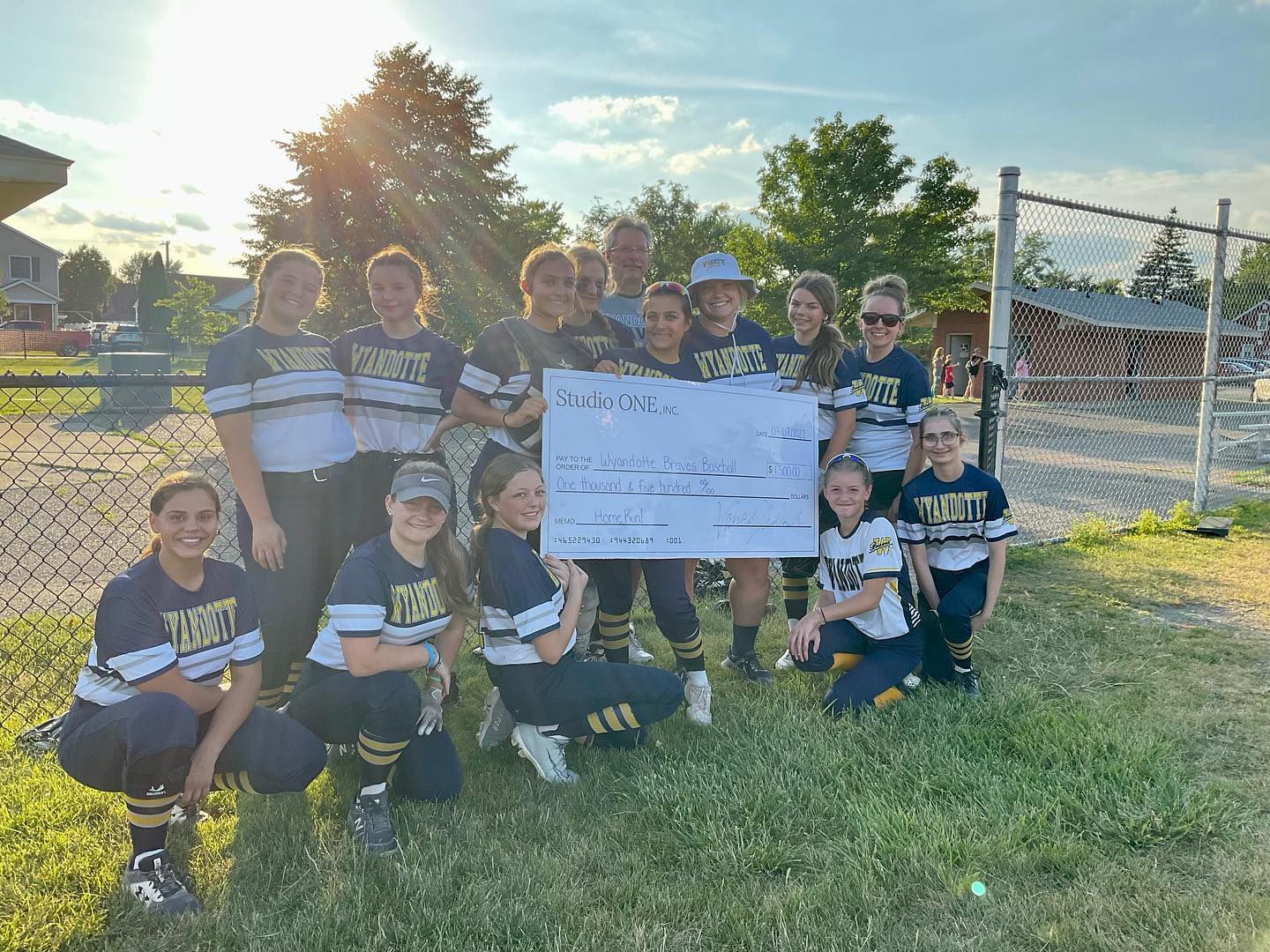 Perfect day for baseball! Even better when you get your MEGA check delivered too! So happy to partner with Wyandotte Braves Baseball and Softball Association every year