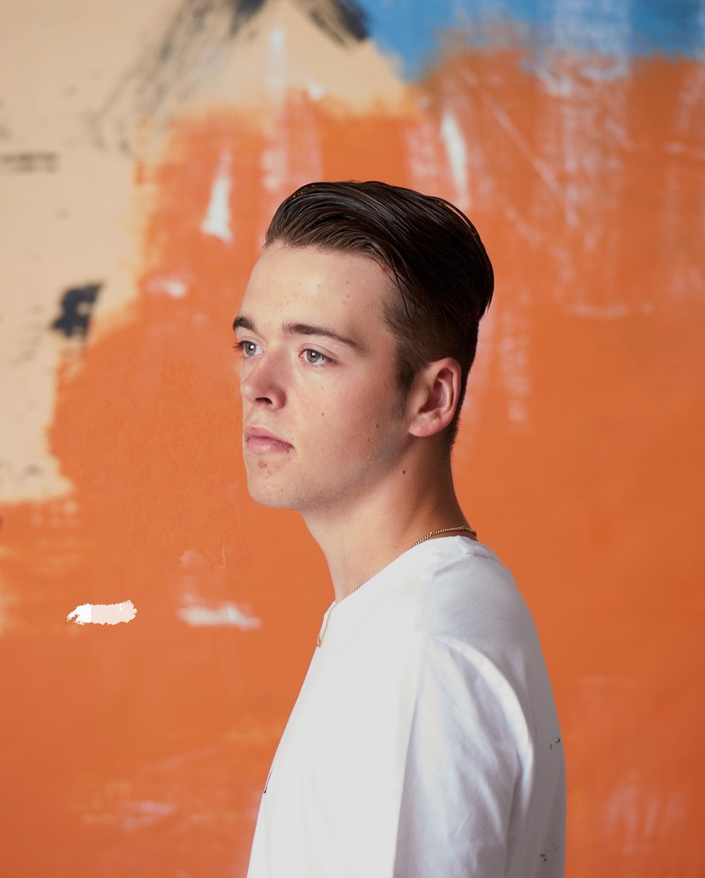 NEW BACKGROUND ALERT! Now Offering our latest custom painted background in-studio called "ORANGE SPLASH" . Book your session today - LINK IN BIO — image 2 of 2