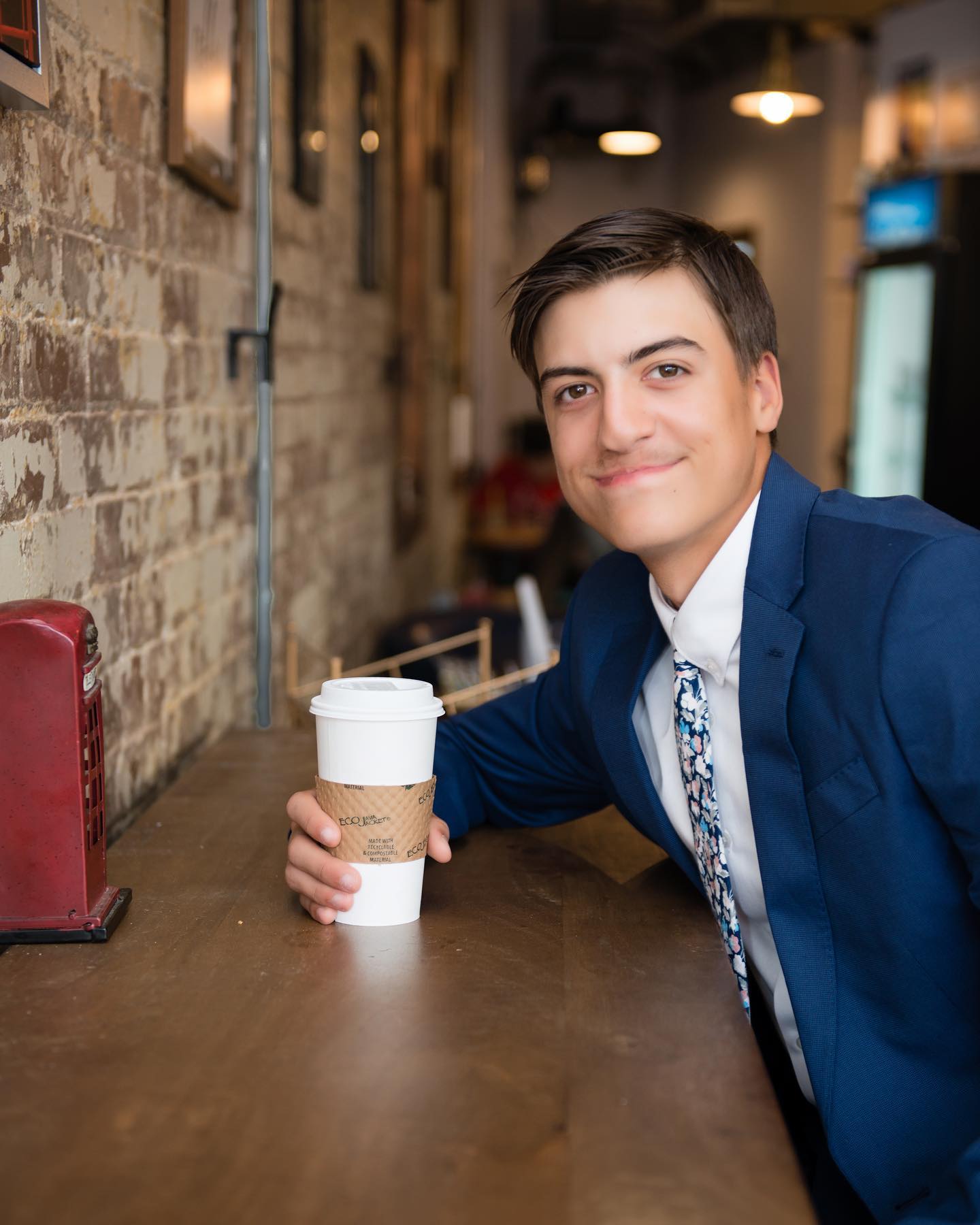 We LOVE our @downtownwyandotte scene for taking photos of our seniors especially our favorite coffee shop @thecoffeeloungewyandotte ! Keeping us working hard. How could we pass up the perfect decor opportunity in there? — image 1 of 4