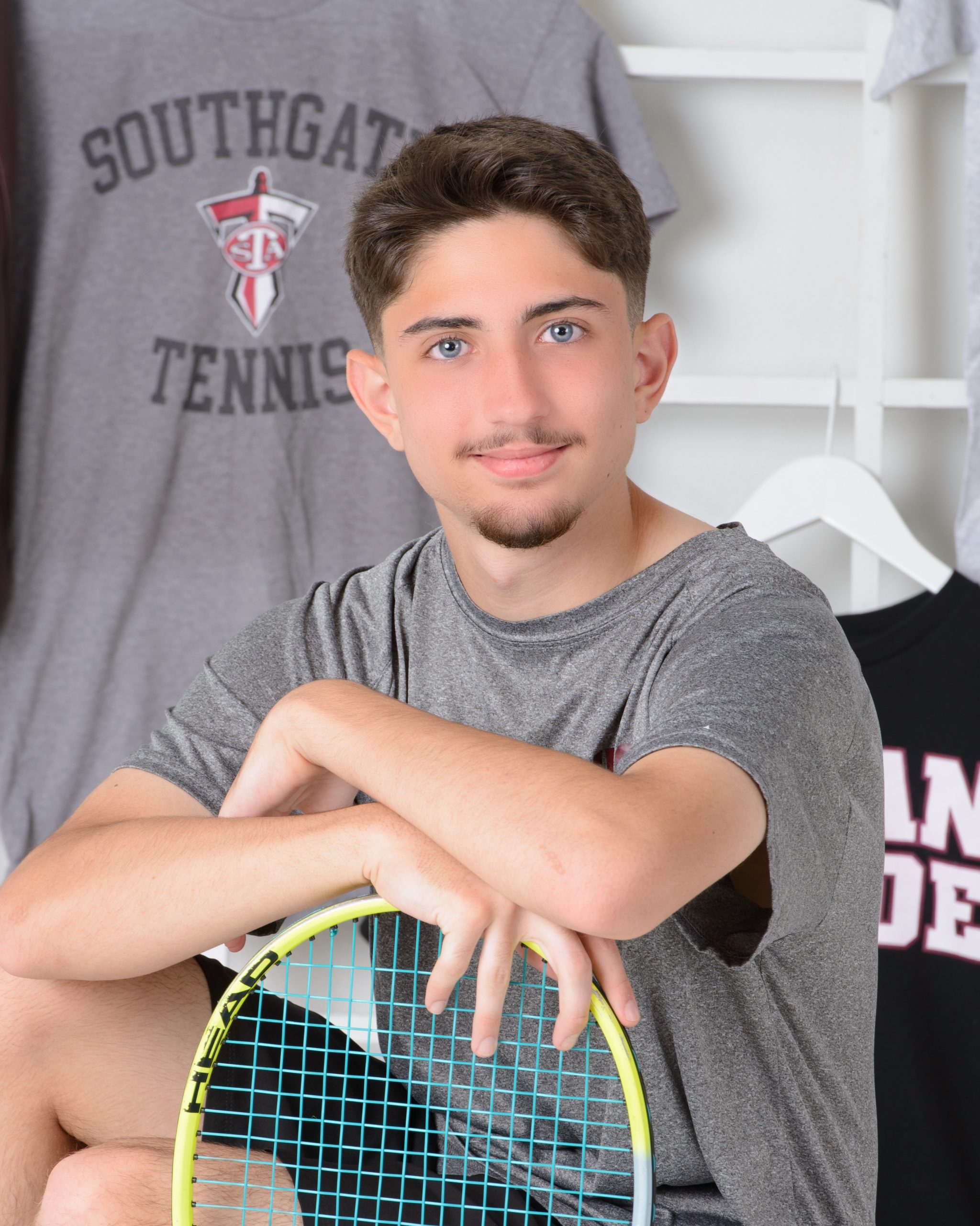 Sean's Southgate-Anderson tennis team photo session with racket