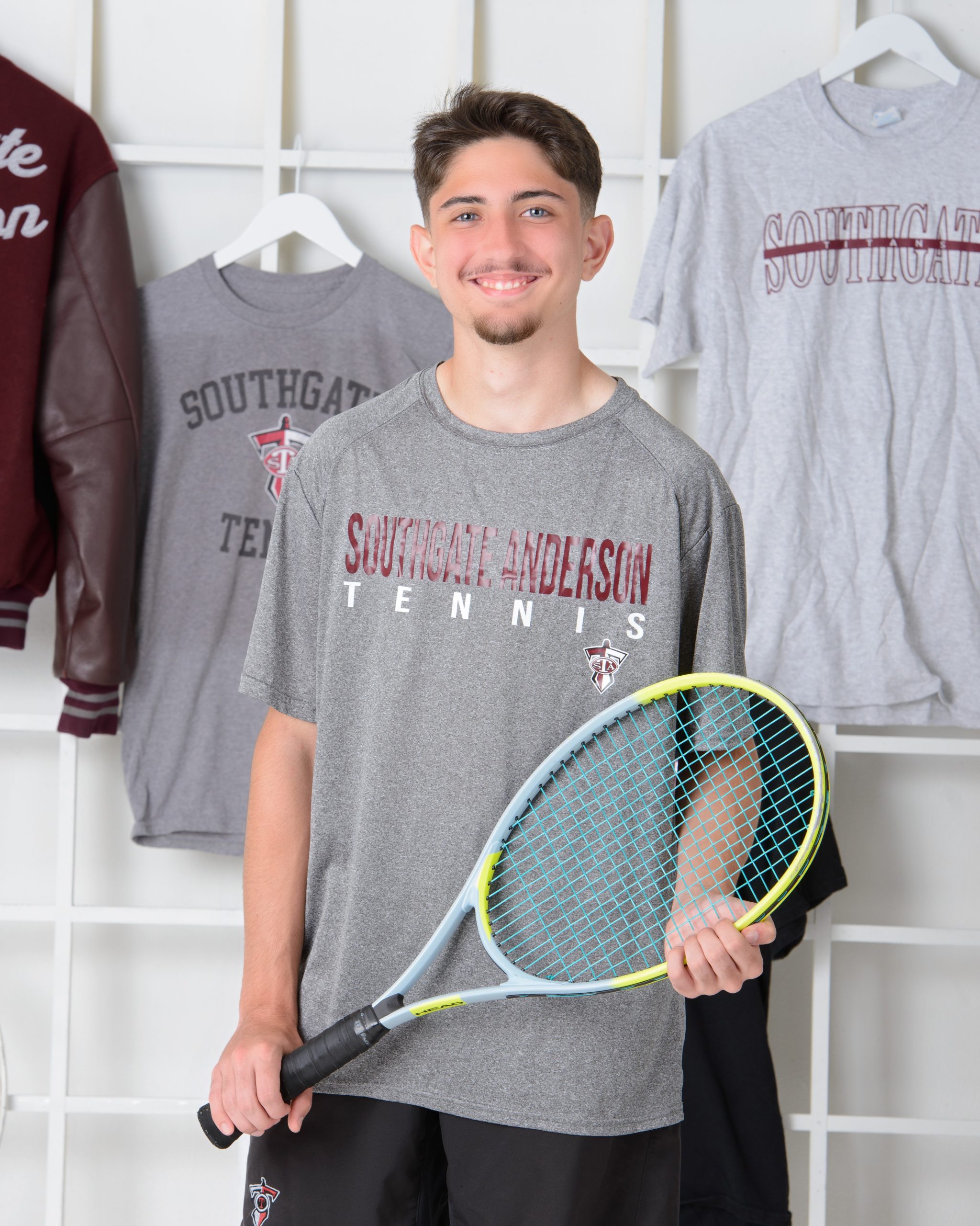 Sean's Southgate-Anderson tennis team photo session with racket
