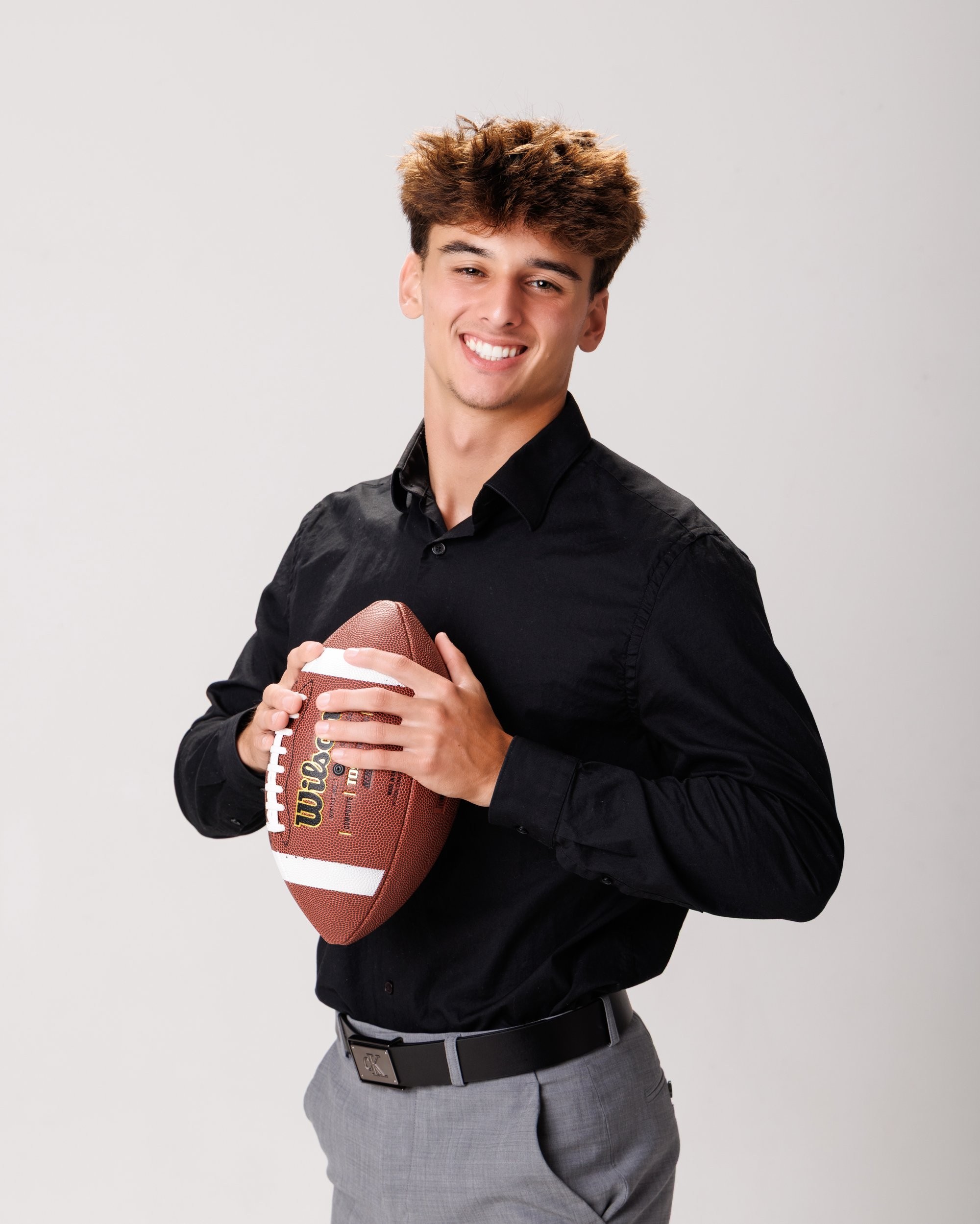Smiling headshot for Trenton photo studio's senior photography portfolio