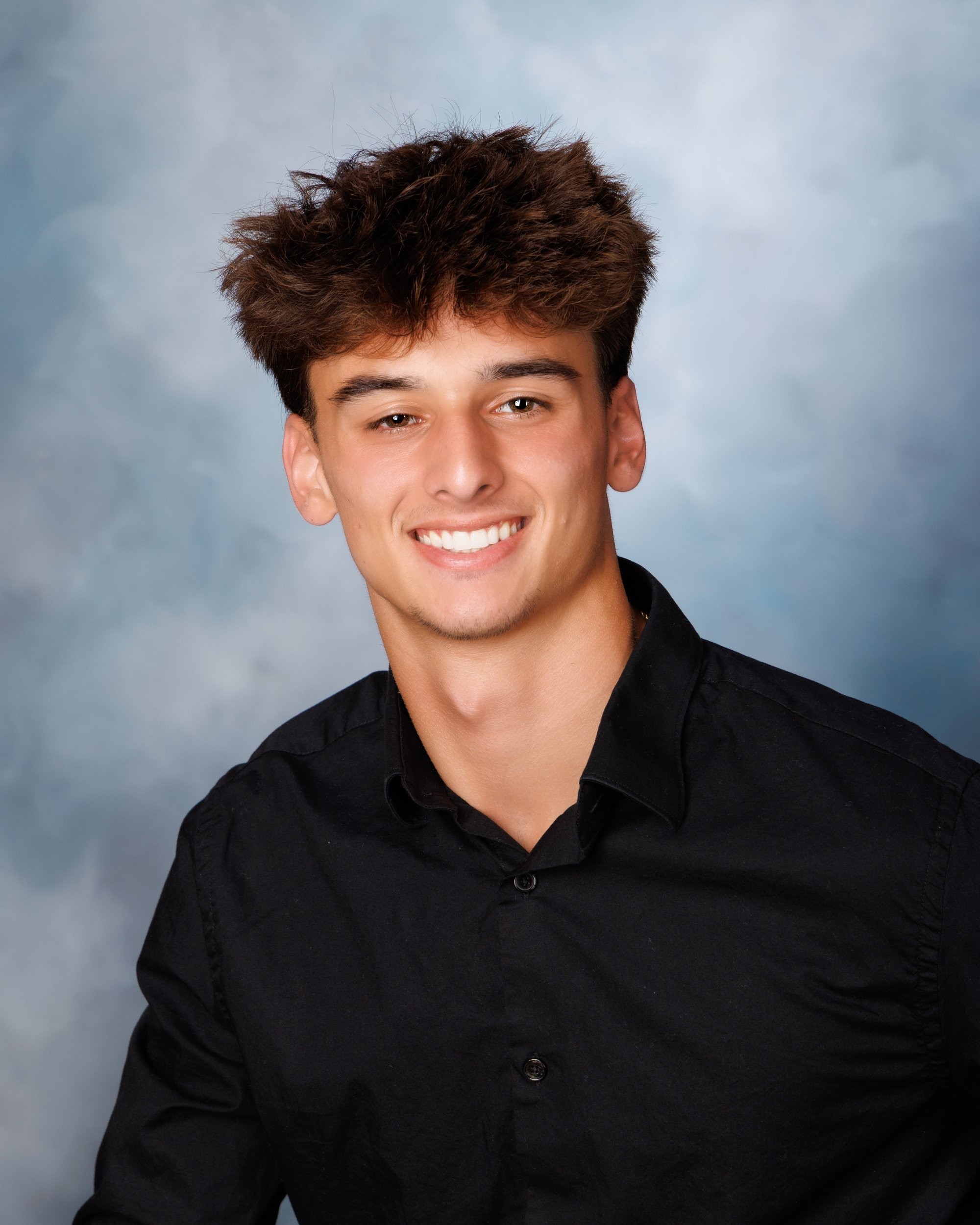 Smiling headshot for Trenton photo studio's senior photography portfolio