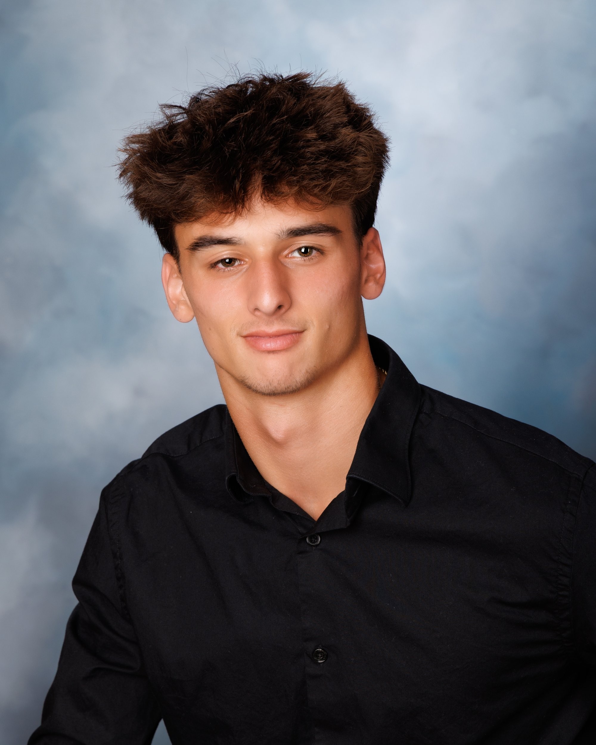 Smiling headshot for Trenton photo studio's senior photography portfolio