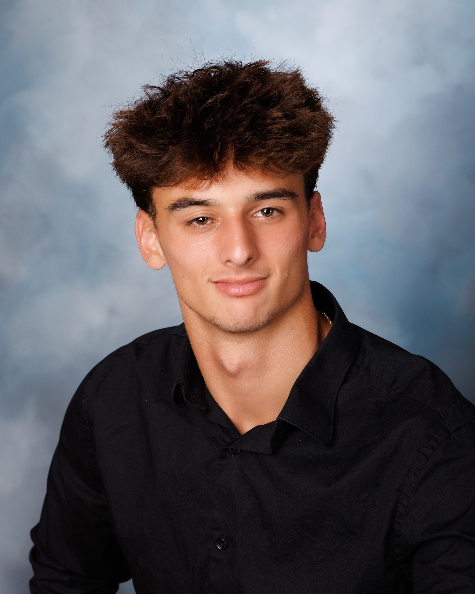 Smiling headshot for Trenton photo studio's senior photography portfolio