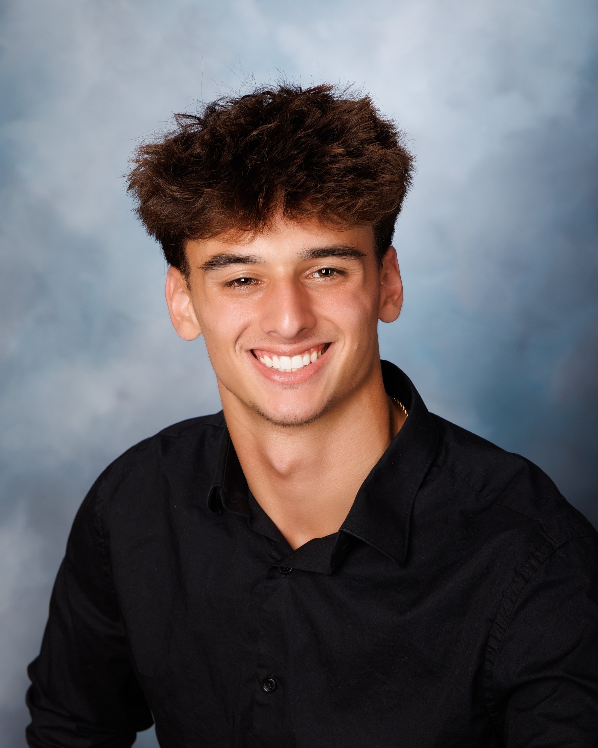 Smiling headshot for Trenton photo studio's senior photography portfolio