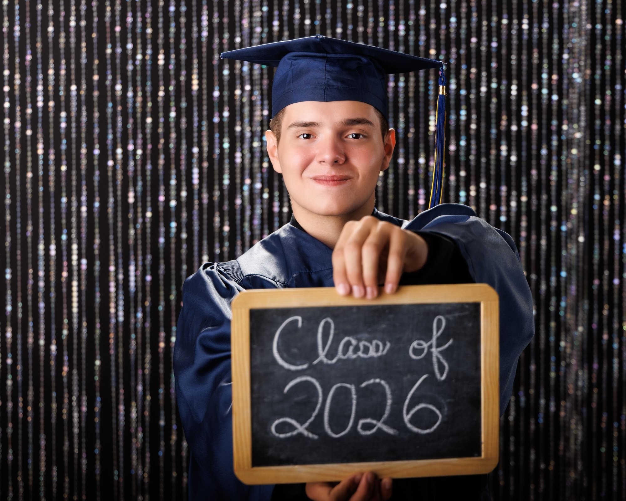 Creative Trenton senior portrait incorporating welding gear and industrial elements to highlight Downriver photography's artistic style